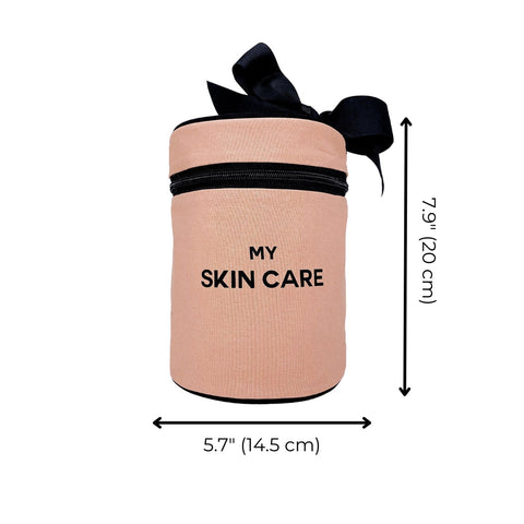 Bag-all Round Skin Care Case with Handle in Pink/Blush featuring black bow accent, text 'MY SKIN CARE', zip closure, 5.7" width, 7.9" height, ideal for beauty organization