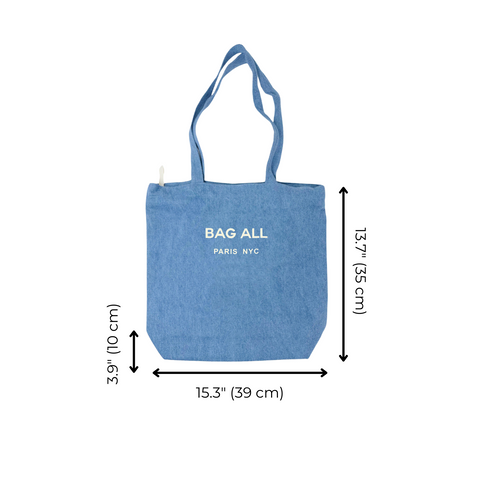 Denim New York City tote bag with zipper, inside pocket, and "BAG ALL PARIS NYC" printed on front.