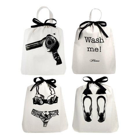 Bag-all Women's Travel Set 4-pack in cream featuring organized storage bags for hairdryer, laundry, lingerie, and ballet flats, decorated with black bow ties and stylish prints on white cotton