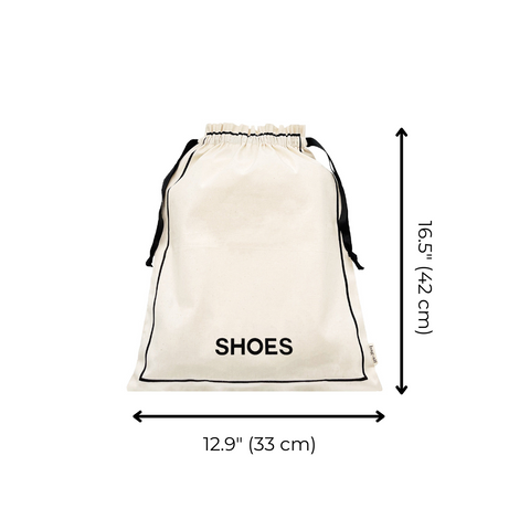 Bag-all Couture Shoe Travel Bag in cream cotton with black text, featuring drawstring closure and compact dimensions of 16.5" x 12.9". Ideal for organizing and protecting footwear.