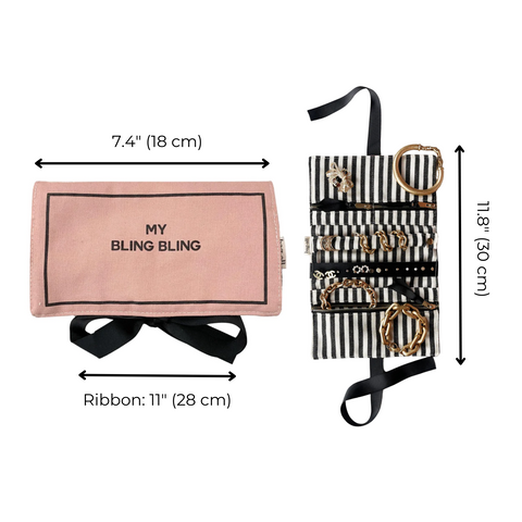 Bag-all Pink Jewelry Organizer Travel Pouch featuring striped interior, three zipper compartments, leather earring holder, and padded ring section. Foldable blush case with black bow, 7.4 x 11.8 inches