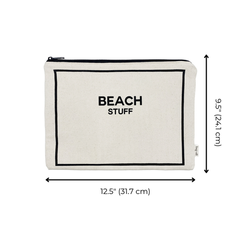 Bag-all Monogram Beach Pouch in cream cotton with black border design, featuring "BEACH STUFF" text and waterproof lining for storing swimwear and sunscreen