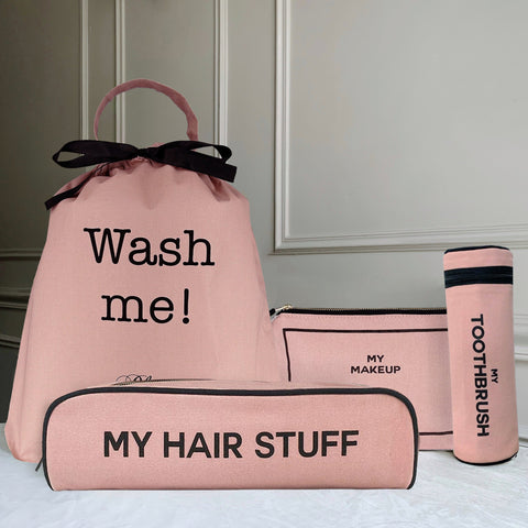 Bag-all Best Value Gift Set featuring pink cotton travel organizers - Wash Me laundry bag, makeup pouch, hair stuff case, and toothbrush holder with black text and trim