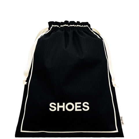 Bag-all Couture Shoe Travel Bag in black cotton with white trim and SHOES text, featuring drawstring closure and elegant minimalist design for stylish footwear storage