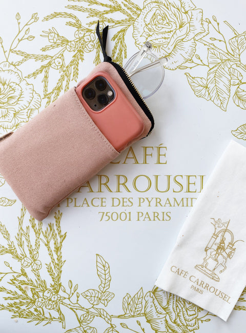 Bag-all My Specs Glasses Case in blush pink with exterior pocket. Cotton case features gold zipper closure and black text detail. Perfect for storing sunglasses and small phones.