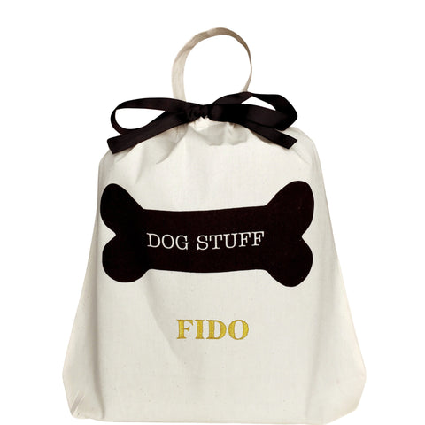 Bag-all cream cotton storage bag with black bone design and 'Dog Stuff' text, customizable with dog's name in gold lettering, featuring black ribbon bow