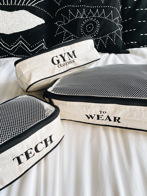 Bag-all organizing cases in white cotton with black mesh: Tech, Gym Clothes, and To Wear packing cubes for travel and home storage - monogram ready for personalization