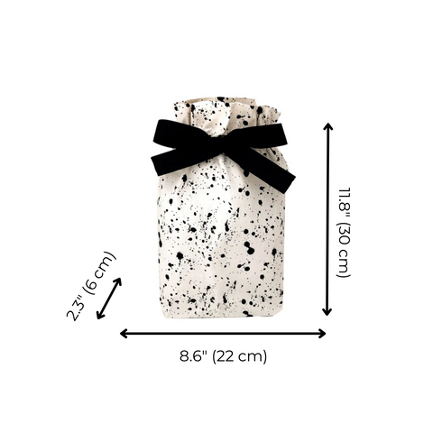 Bag-all Gift Bag Splatter Small: Eco-friendly reusable cotton gift bag in white with black paint splatter pattern and black bow, showing measurements 11.8" x 8.6" x 2.3