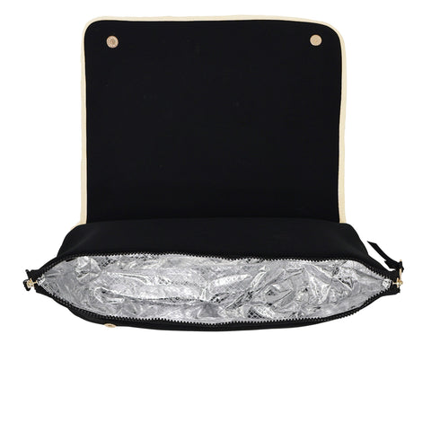 Black travel case open to show heat-resistant silver lining inside for storing hot hair styling tools safely.