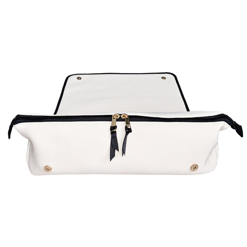 Cream-colored hair tools travel case with black zipper and heat-resistant mat for styling tools storage and organization