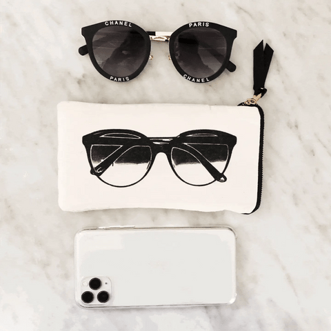 Bag-all Glasses Case with Outside Pocket in cream featuring stylish black sunglasses print on marble background with designer eyewear and phone accessory styling