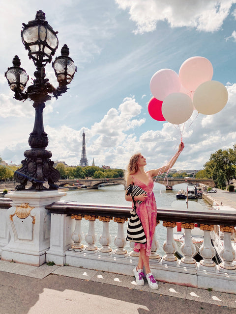 Bag-all Striped Large Gift Bag shown with Paris cityscape, featuring vintage lamp post, Eiffel Tower view, and pastel balloons on iconic bridge with Seine River below