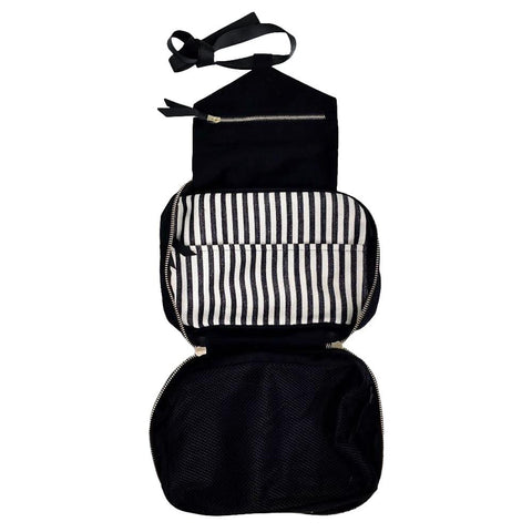 Bag-all Folding/Hanging Toiletry Case in black cotton with striped interior compartments, featuring three organized sections and hanging ribbon for travel convenience