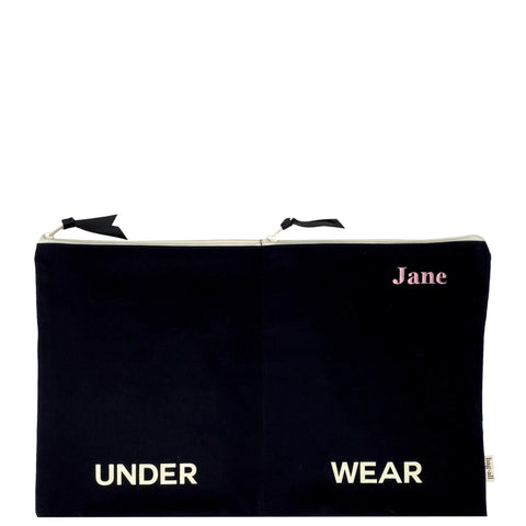 Bag-all Double Lingerie Packing Pouch in Black cotton with 'UNDER WEAR' text and personalized name, featuring dual zipper compartments and recycled grosgrain ribbon closures