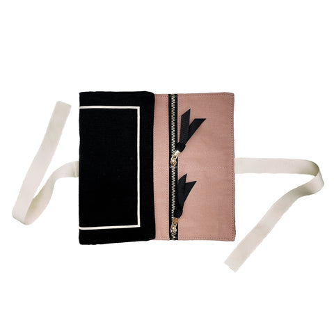 Bag-all Couture Jewelry Roll Medium Black - Elegant travel organizer with pink interior, dual zipper compartments and white tie straps for securing precious accessories