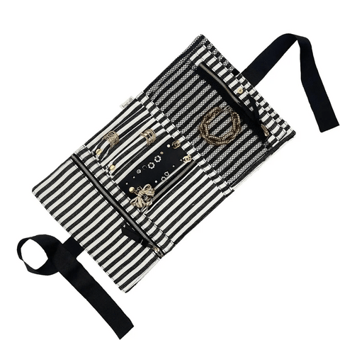 Bag-all Large Jewelry Roll in stylish black and white stripes, featuring multiple compartments, secure closures, and black ribbon ties for elegant jewelry storage and travel organization