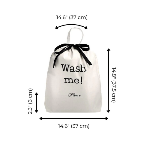 Bag-all cream cotton laundry bag with "Wash me!" text and black ribbon tie, showing dimensions 37x37cm with 6cm handle height