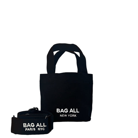 Bag-all Mini Black Cotton Tote Bag with adjustable strap and interior pocket, featuring classic design with white logo branding from New York collection