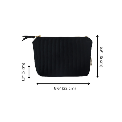 Black quilted velvet makeup pouch with coated lining, measuring 8.6x5.9x1.9 inches, compact and stylish for travel.
