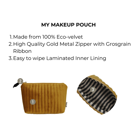 Quilted yellow velvet makeup pouch with gold zipper and striped laminated inner lining for easy cleaning.