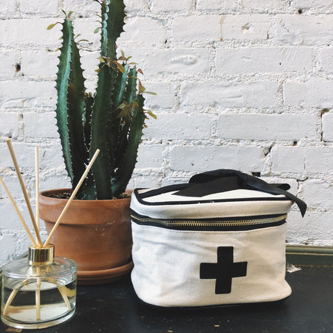 Bag-all Meds and First Aid Storage Box in cream cotton with black cross, zippered closure and recycled bow, perfect for organized medicine storage