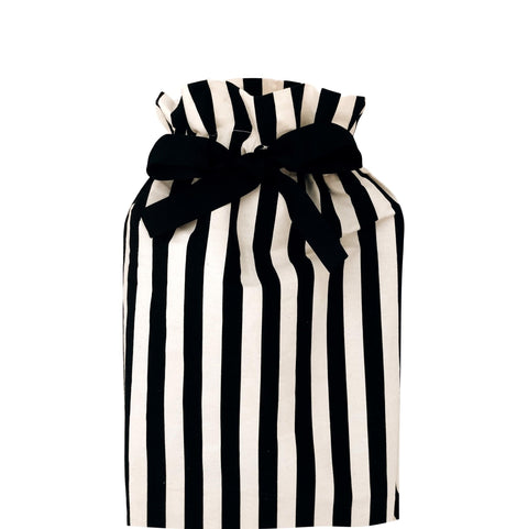 Bag-all Gift Bag Striped Medium - Reusable cotton gift bag with classic black and white vertical stripes and elegant black bow closure, perfect for sustainable gift wrapping