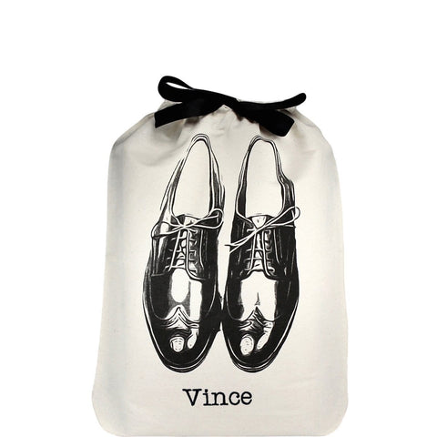 Bag-all Men's Shoe Bag in cream with black dress shoe illustration and black ribbon tie, featuring customizable monogram name Vince. Premium cotton storage solution for footwear protection