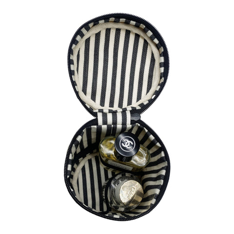 Bag-all Round My Scents Case in cream with black and white striped interior, featuring secure compartments for perfume bottles and luxury fragrances, displayed open with sample bottles