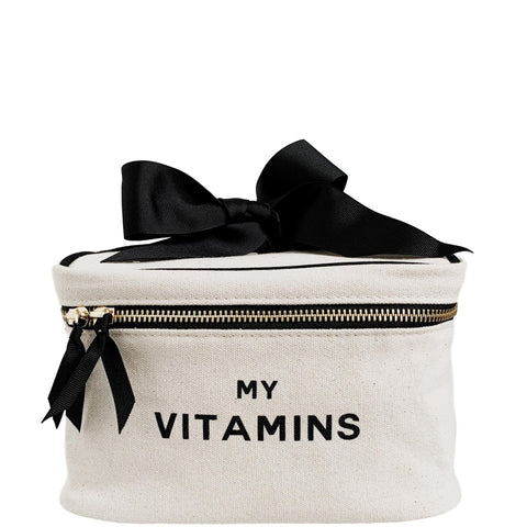 Bag-all Vitamins Storage and Travel Box in cream canvas with black bow, silver zipper and My Vitamins text print, perfect for organizing supplements