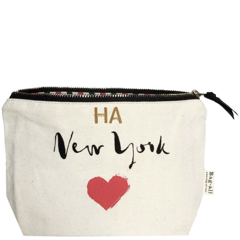 Bag-all New York Heart Pouch in cream canvas with black zipper, featuring handprinted text and red heart design - stylish city-themed travel accessory