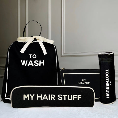 Bag-all Best Deal Gift Set featuring black cotton travel organizers: To Wash laundry bag, My Hair Stuff case, My Makeup pouch, and Toothbrush case with white trim