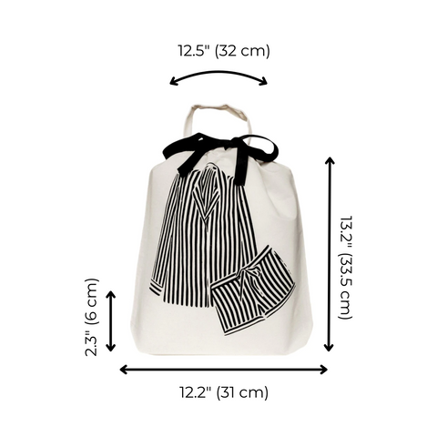 Bag-all Striped Pajamas Travel Bag in cream cotton with black bow and illustrated striped pajama set, perfect for organizing clothes at home or travel, 32x31cm