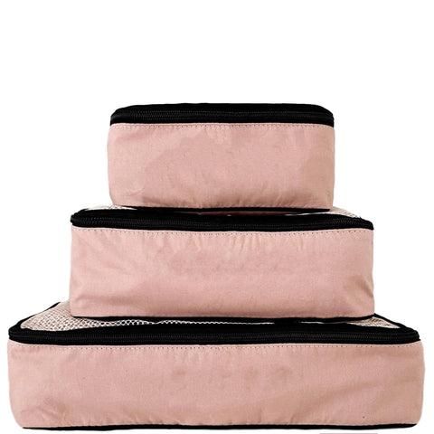 Bag-all Travel Glam 4-Pack in pink/blush cotton featuring organizer cubes for clothes, lingerie, makeup, and tech accessories with black zipper trim