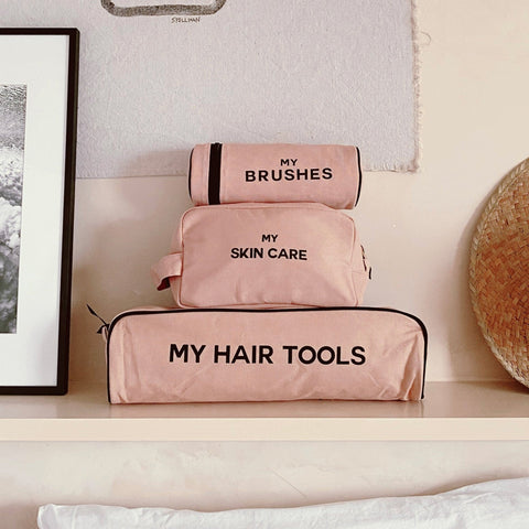 Bag-all Pamper Gift Set Deal 3-Pack featuring pink cotton organizers for hair tools, brushes, and skincare - stylish beauty storage cases with black text labels