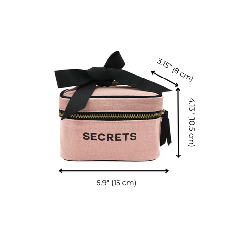 Bag-all Mini Beauty Box for Secrets in blush pink cotton with black bow, double zipper, and dimensions 5.9x4.15x3.15 inches, perfect for cosmetics storage