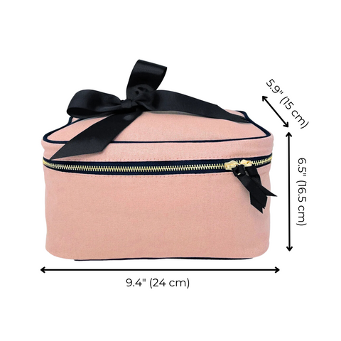 Bag-all Medium Box Makeup & Toiletry in blush pink cotton with black bow, striped interior lining, metal zipper, measurements 9.4" x 6.5" x 5.9