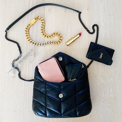 Bag-all Pink Jewelry Trinket Box shown with designer handbag, gold chain bracelet, and lipstick in stylish flat lay composition featuring quilted black leather accessories and fashionable details