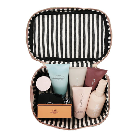 Bag-all My Makeup Cosmetic Box Pink Velvet featuring striped interior lining, organized beauty products, and waterproof compartments for secure storage of makeup and skincare items
