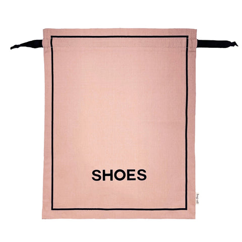 Bag-all Couture Shoe Travel Bag in pink blush with black border and text, featuring drawstring closure and eco-friendly material for stylish footwear organization