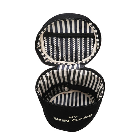 Bag-all Round My Skin Care Case in black with striped interior lining, mesh pocket, and elastic bands for secure skincare storage and organization