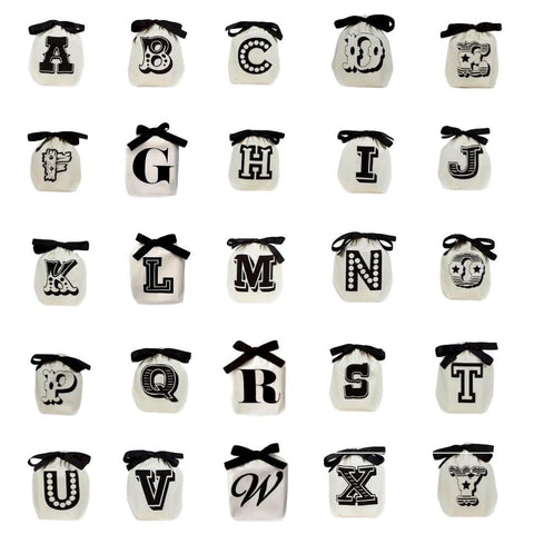 Bag-all Small Letter Bags Mix in cream featuring alphabet A-Z on individual cotton bags with black bows, perfect for organizing small items and collectibles
