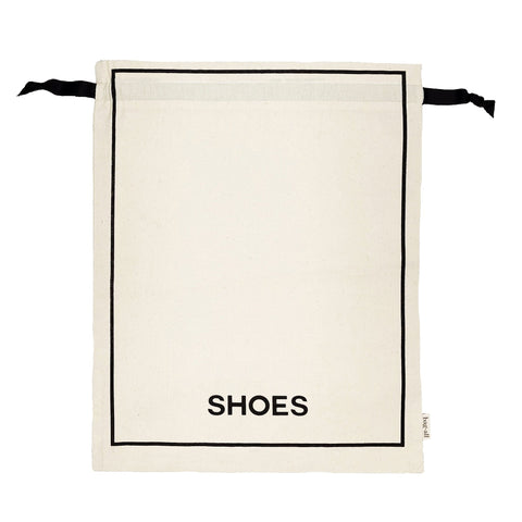 Bag-all Couture Shoe Travel Bag in cream canvas with black border trim and SHOES text print, featuring drawstring closure and eco-friendly water-based ink
