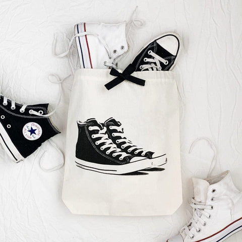 Bag-all Cream Sneakers Shoe Bag featuring classic high-top sneaker print, stylish black bow detail, perfect for organizing and protecting footwear during travel or storage