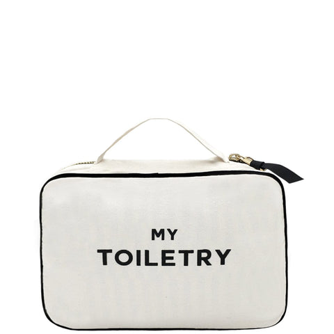 Bag-all Folding/Hanging Toiletry Case in cream with 'My Toiletry' text, featuring three compartments, zippered closure, handle, and hanging ribbon for convenient bathroom organization