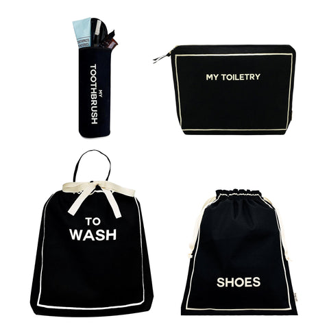 Bag-all Toiletry Travel Gift Set 4-Pack in black featuring cotton organizer bags: My Toiletry pouch, Toothbrush case, To Wash bag, and Shoes bag with white trim and text