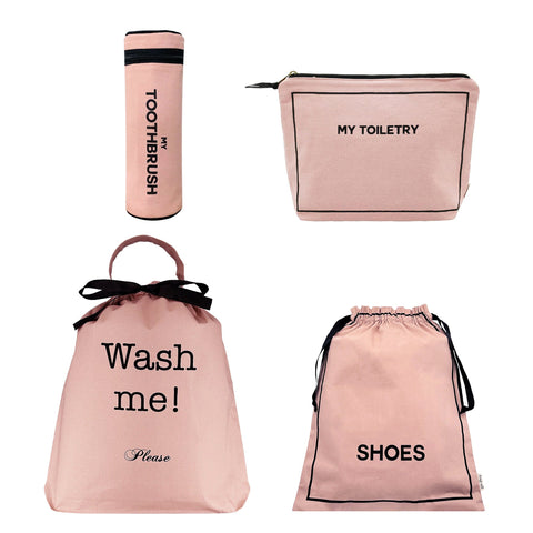 Bag-all Voyager Gift Set featuring pink cotton travel organizers: toiletry pouch, toothbrush case, shoe bag, and wash bag with black text details and zipper closure