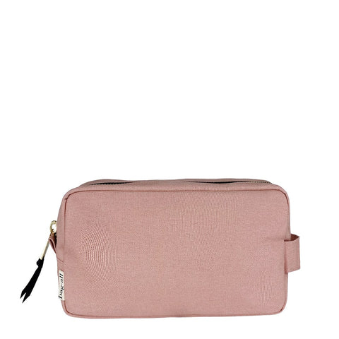 Bag-all My Skin Care Organizing Pouch in blush pink cotton with waterproof lining, gold zipper, and side handle for travel and bathroom storage
