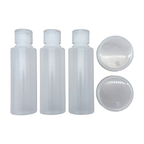 Three clear refillable travel bottles and two round caps for carry on liquids case accessories