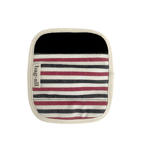 Bag-all Luggage Handle Cover featuring striped pattern in black, pink and grey on cream canvas, with branded tag. Stylish comfort grip for travel bags.