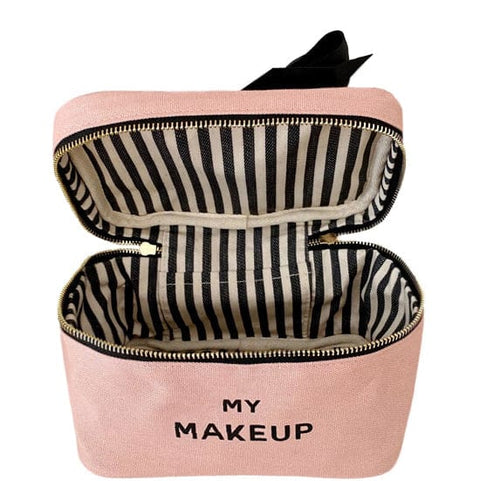 Bag-all My Makeup Cosmetic Box in blush pink with striped interior, black bow accent, and gold zipper - stylish storage for beauty essentials, featuring laminated lining